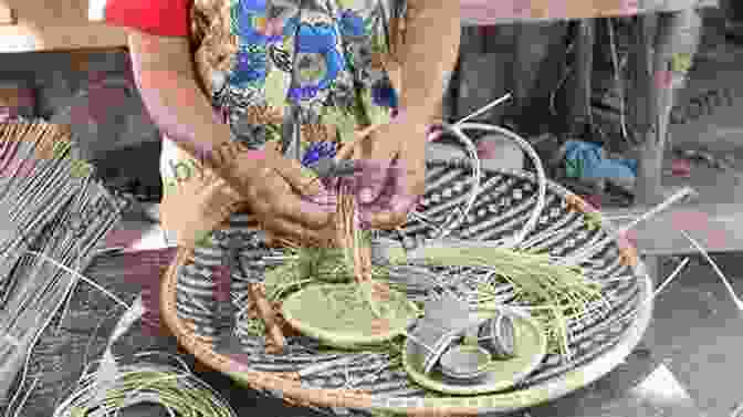 A Gebusi Woman Weaving A Traditional Basket Using Materials Sourced From The Rainforest The Gebusi: Lives Transformed In A Rainforest World