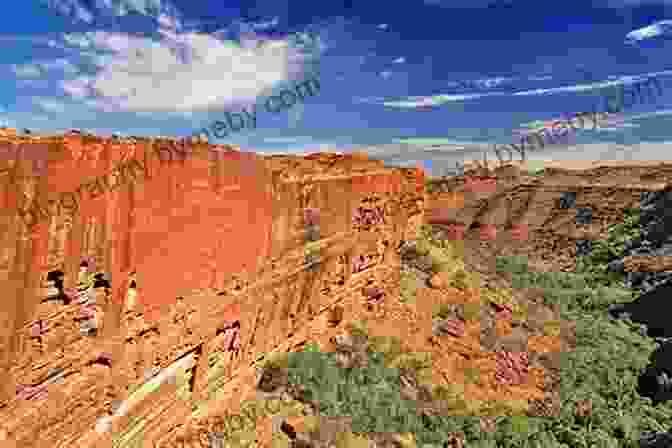 A Group Of Hikers Exploring The Majestic Kings Canyon, Marveling At Its Towering Sandstone Walls And Sheer Cliffs. Australian Memories: Discover Aussie Land And The Mysterious Red Center (Travels And Adventures Of Ndeye Labadens 1)