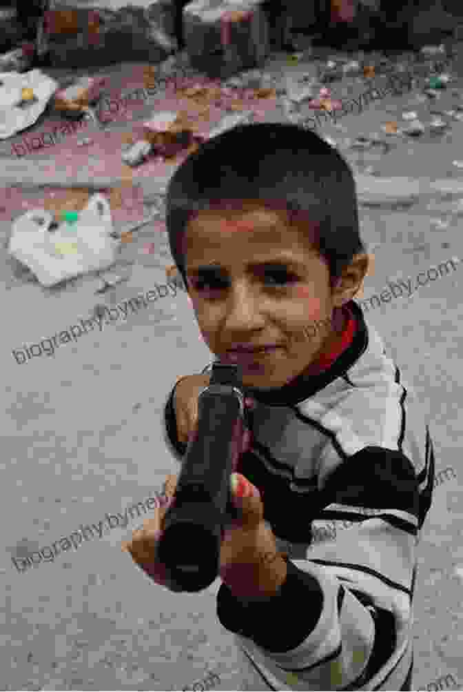 A Young Boy Holding A Gun In A War Zone War Child: A Child Soldier S Story